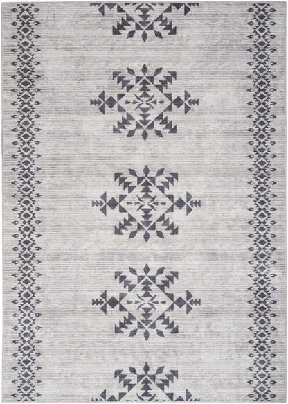 5' x 7' Geometric Power Loom Washable Area Rug - Gray And Ivory