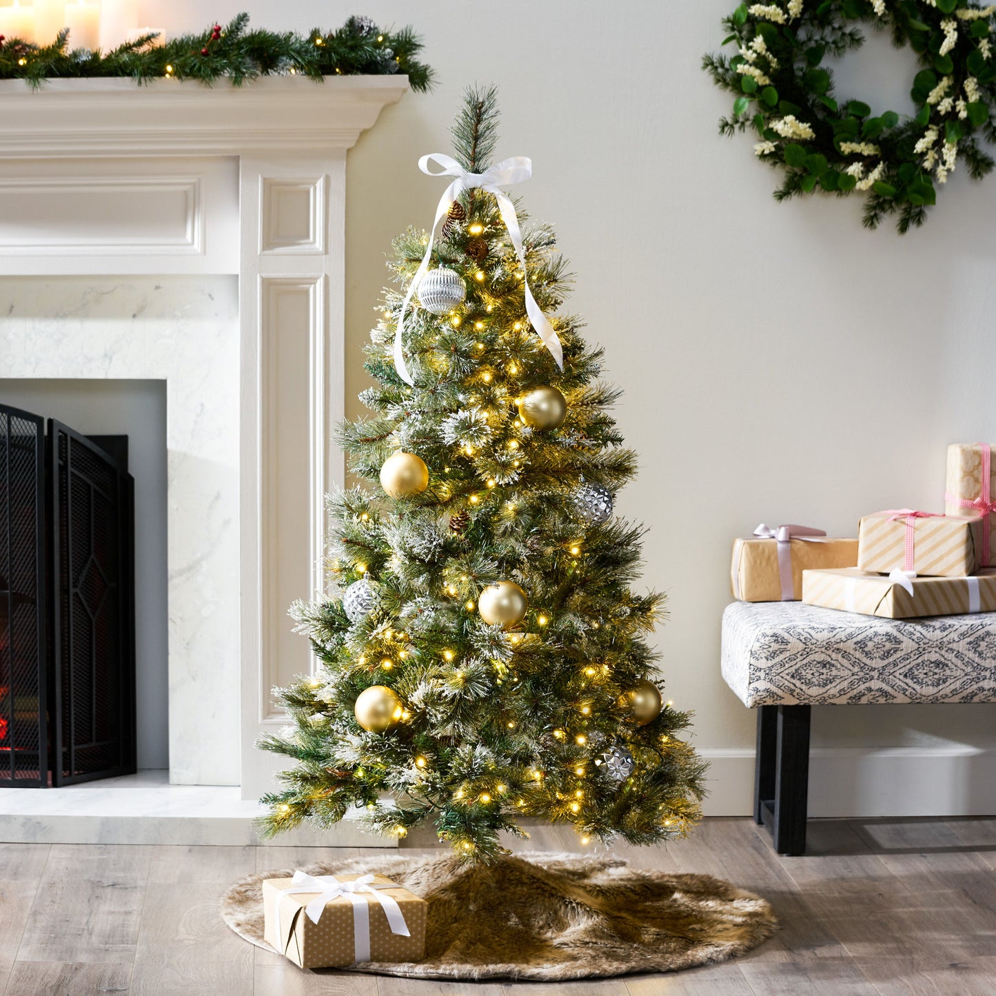 4.5' Brilste Mixed Hinged Tree With Snow And Glitter And 34 Frosted Pine Cones And 250 Clear LED Lights