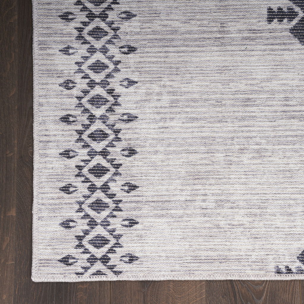 5' x 7' Geometric Power Loom Washable Area Rug - Gray And Ivory