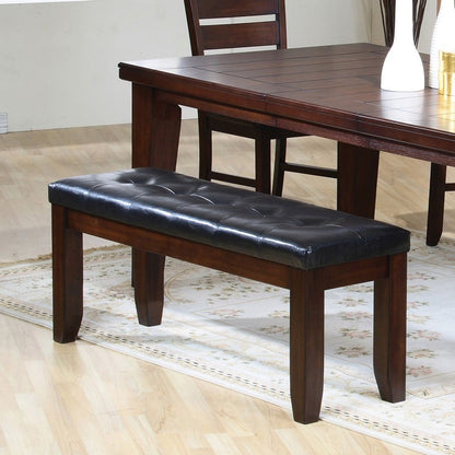 The Urbana dining bench helps replace chairs, giving your Decor a less cluttered look. Its wide frame is built using tough wood solids and features stretcher bars to help support the tapered block legs.